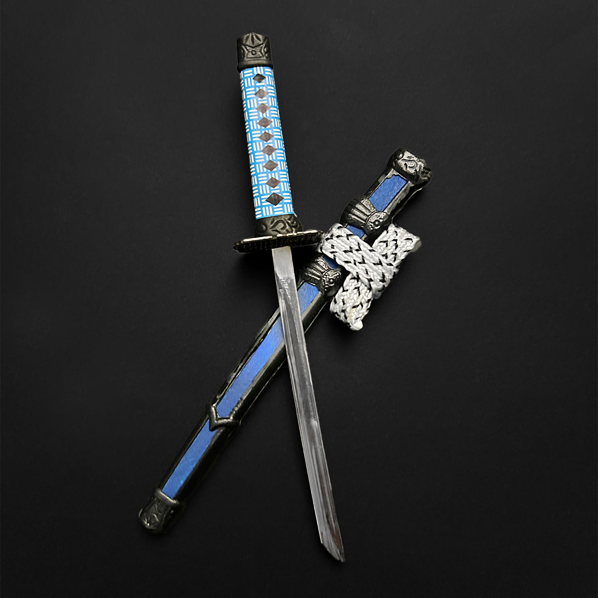 Guild Arms Mini Katana Letter Opener with intricate blue handle and decorative accents