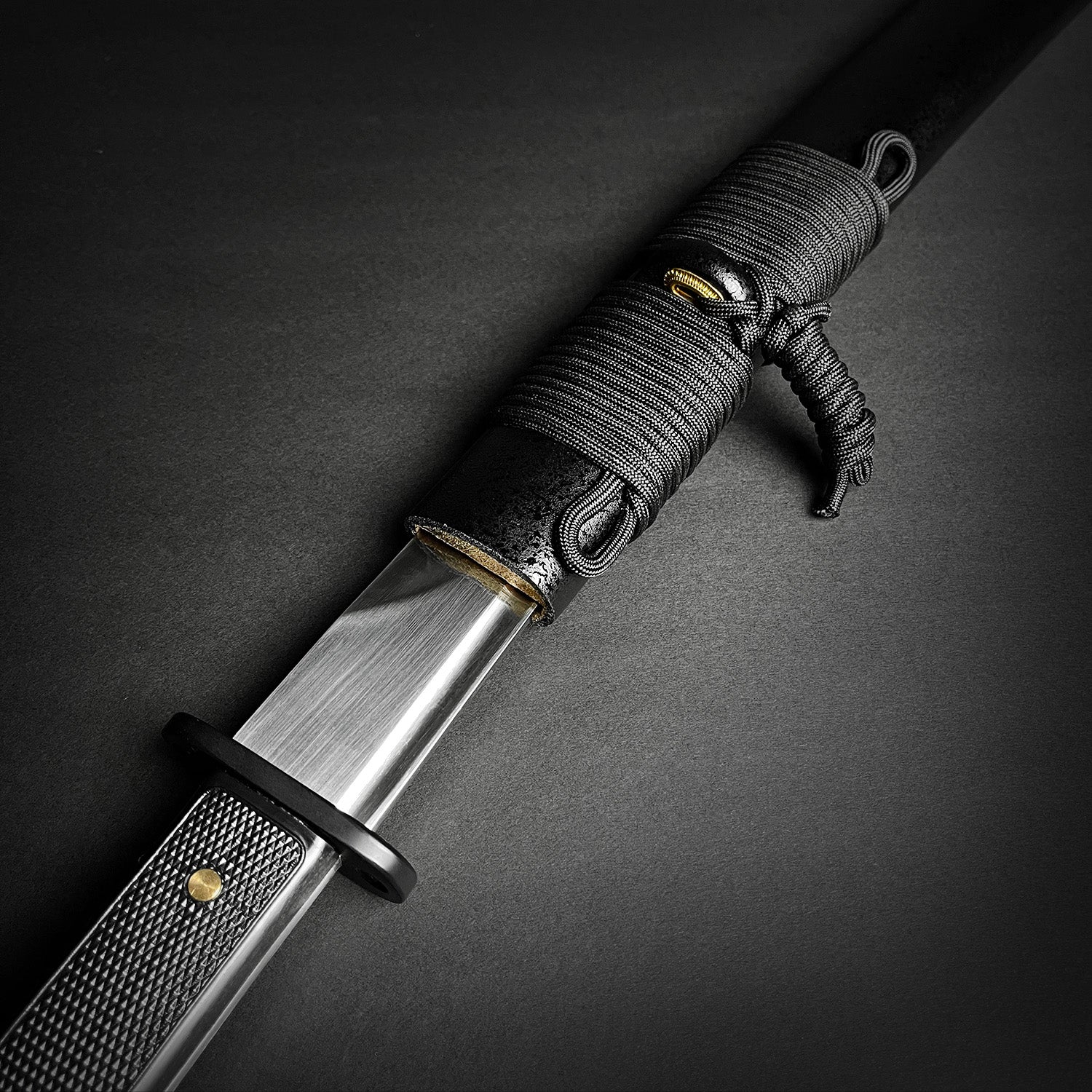Musashi Modern Tactical Wakizashi with black handle and polished blade detail