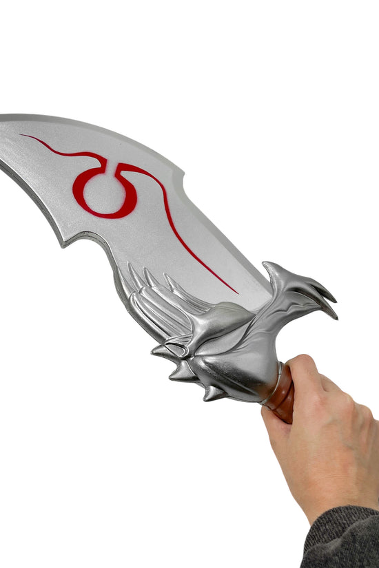 Guild Arms Mythical War Foam Cosplay Dagger from Video Game held in hand with intricate design