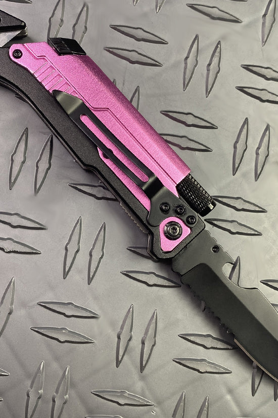 Pink Multi-Tool Folding Knife with Flashlight survival knife with fire starter and serrated blade on metal surface