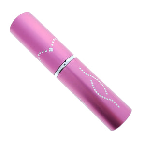 Guild Arms pink rechargeable compact stun gun with a sleek design and decorative details
