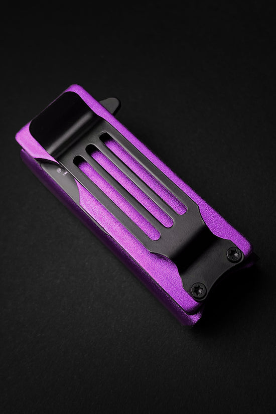 Guild Arms purple knife lighter holder case with black clip on a black background