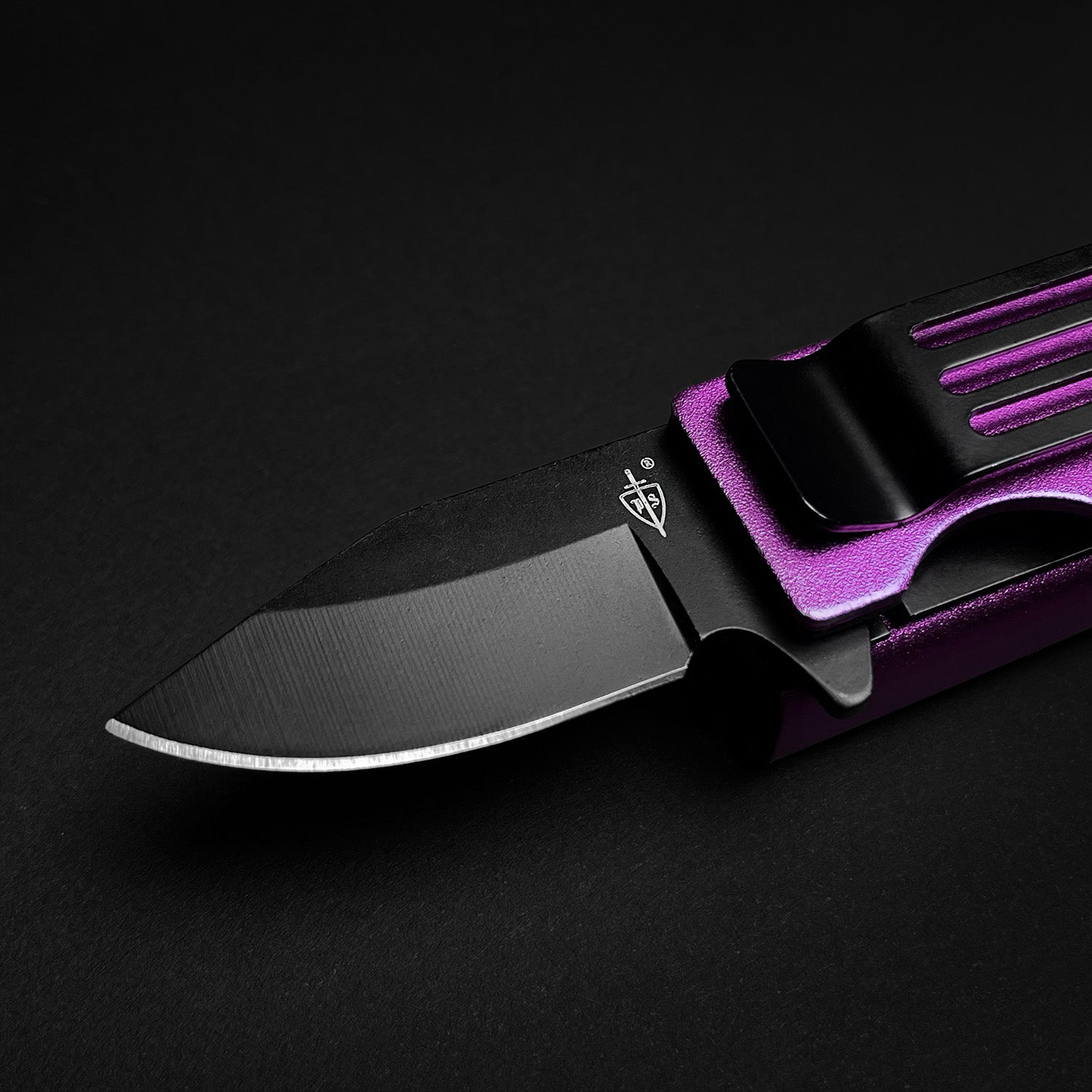 Guild Arms lighter knife with black blade and purple handle featuring knife lighter holder case