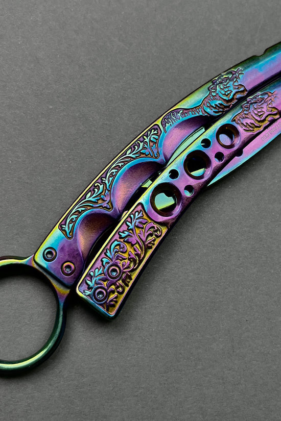 Guild Arms rainbow butterfly trainer knife with intricate engraved design and vibrant multicolor finish