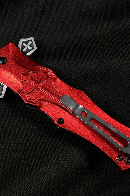Red cross handle spring pocket knife by Guild Arms featuring a sleek design and sturdy clip