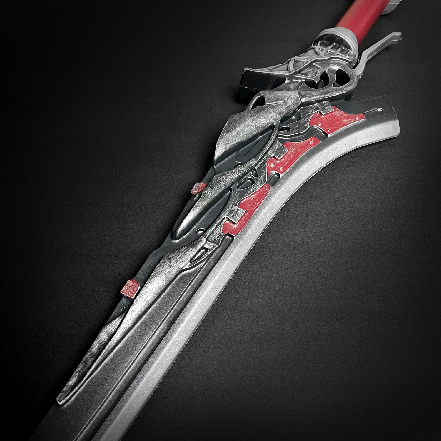 Red Queen Foam Sword by Guild Arms with intricate design and a vibrant red blade for safe play