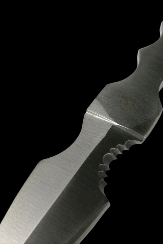 Falcon silver fixed blade tactical knife with serrated edge and textured grip handle