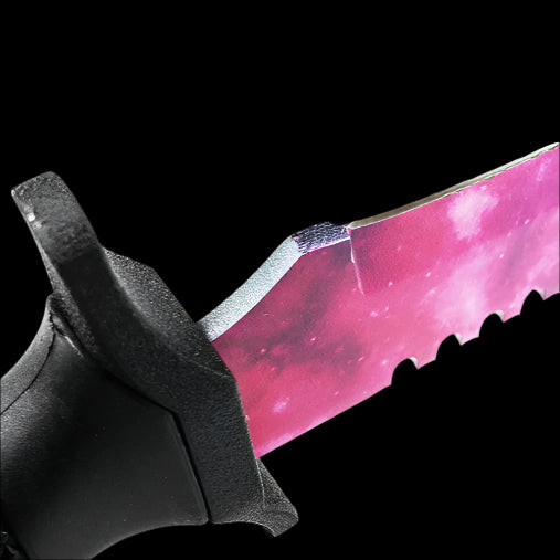 Guild Arms Hunting Knife Galaxy Purple Blade Tactical Knife close up showing serrated pink galaxy blade and black handle
