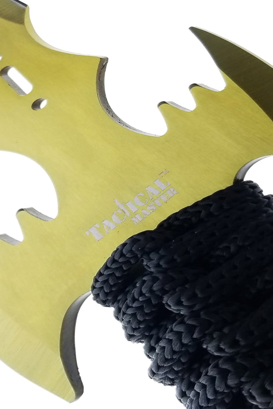 Close-up of Tactical Machete and Throwing Knives Set Gold with a textured black handle for a secure grip