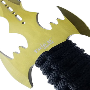Close-up of Tactical Machete and Throwing Knives Set Gold with a textured black handle for a secure grip