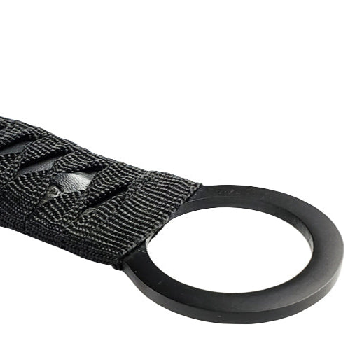 Close-up of the handle of the Tactical Master Red Machete With Throwing Knives featuring a textured grip