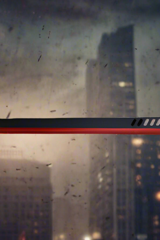 Tactical Master Red Machete With Throwing Knives featuring a sleek design against an urban backdrop