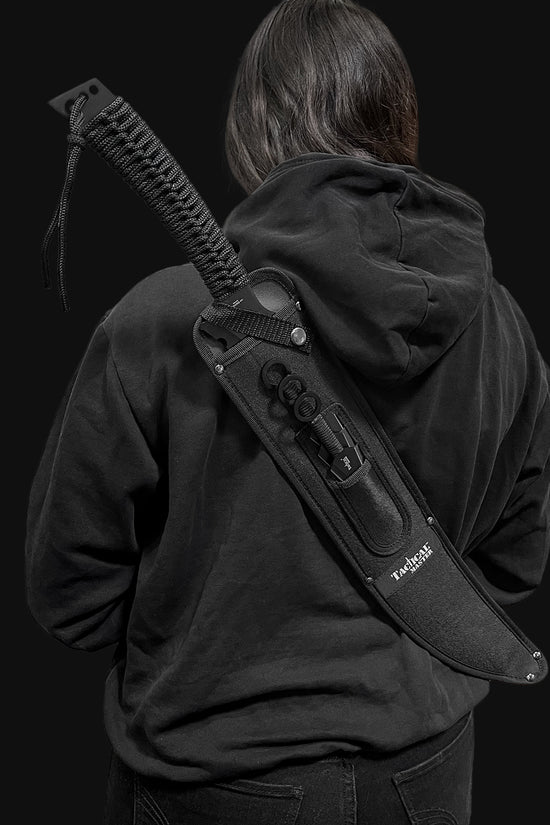 Tactical Master tactical machete with throwing knives in black sheath carried on back