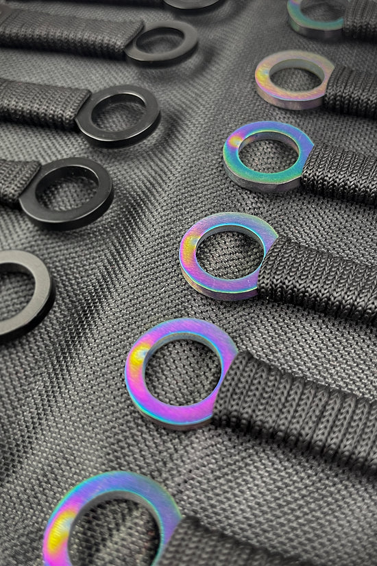 Target Master 12 PCS Rainbow & Black Throwing Knife Set with durable grips and sleek design