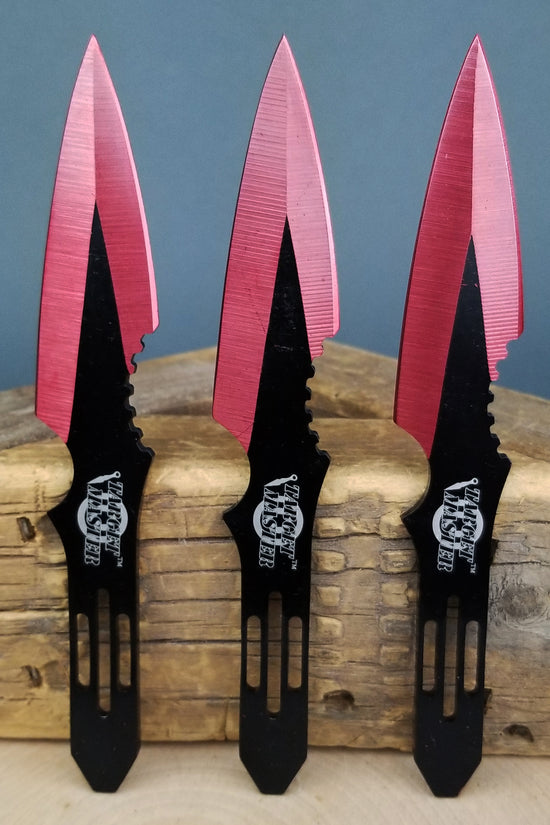 Red throwing knives set by Target Master with a sleek design and sharp edges for precision throwing