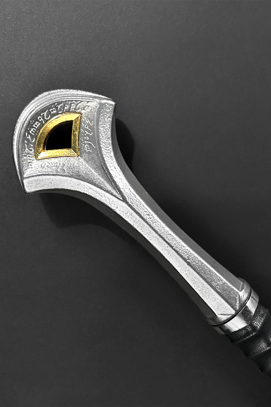 The Valorbrand – Knight’s Collection Elite Medieval Sword handle featuring intricate metal design and gold accents