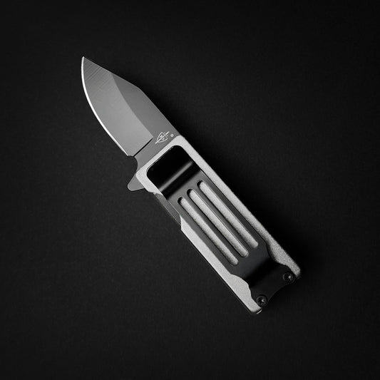 Guild Arms Lighter Case EDC spring assist knife with matte gray folding blade and textured aluminum handle