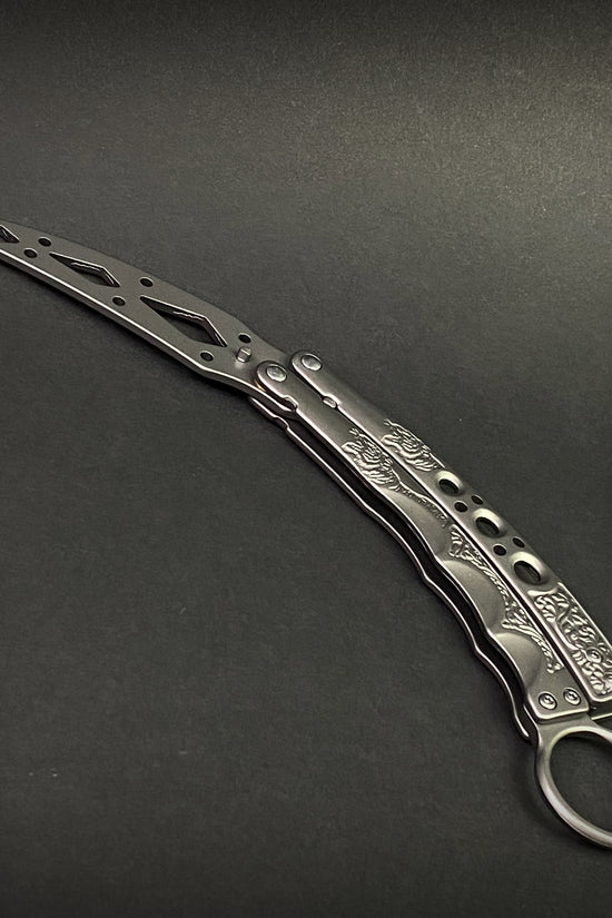 Guild Arms butterfly knife trainer for beginners with detailed cutout blade and engraved handles