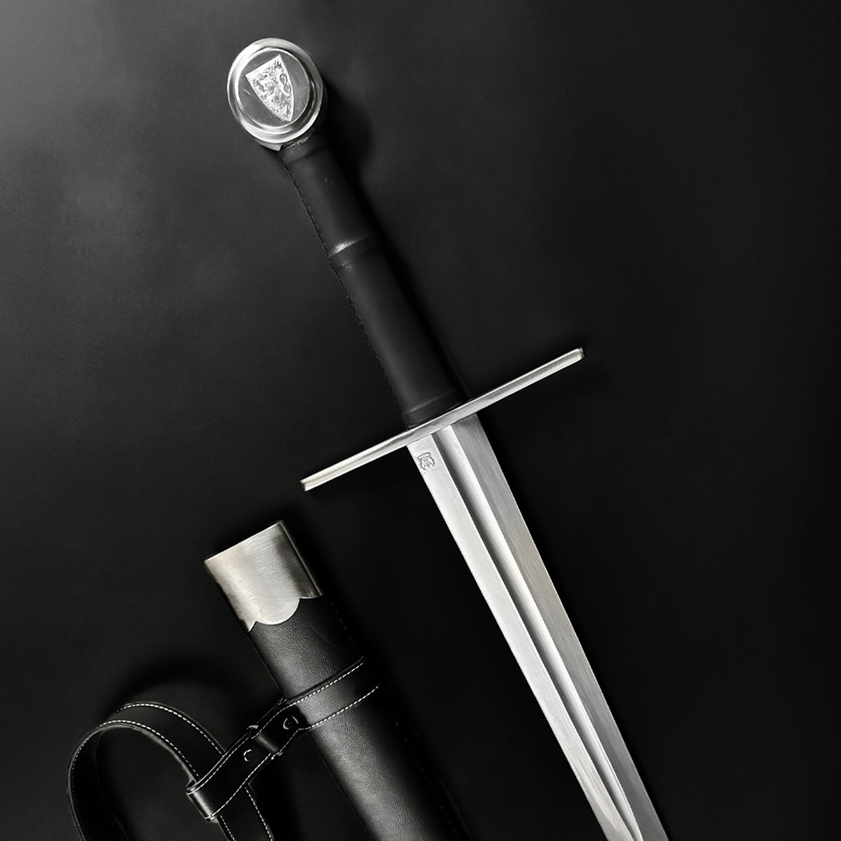 Valebrand medieval sword for sale with a sharp blade and black leather sheath