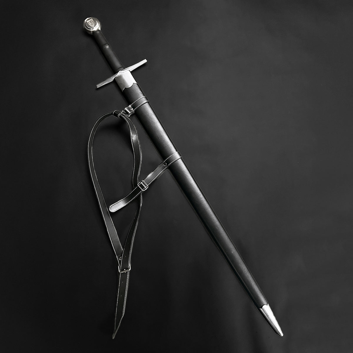 Valebrand medieval sword for sale with a sleek black handle and polished steel blade
