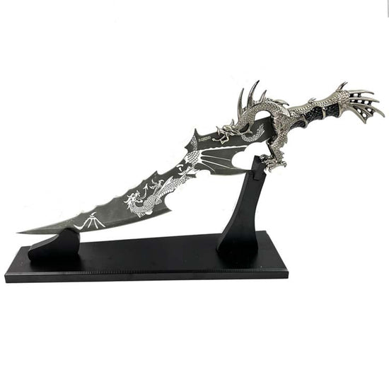 Dragon Fantasy Dagger with Stand, featuring intricate designs and a sleek blade for collectors.