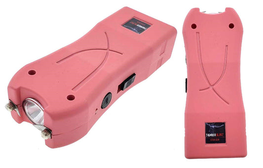 Portable PINK STUN GUN with Flashlight by Guild Arms shown from two angles with safety switch and flashlight